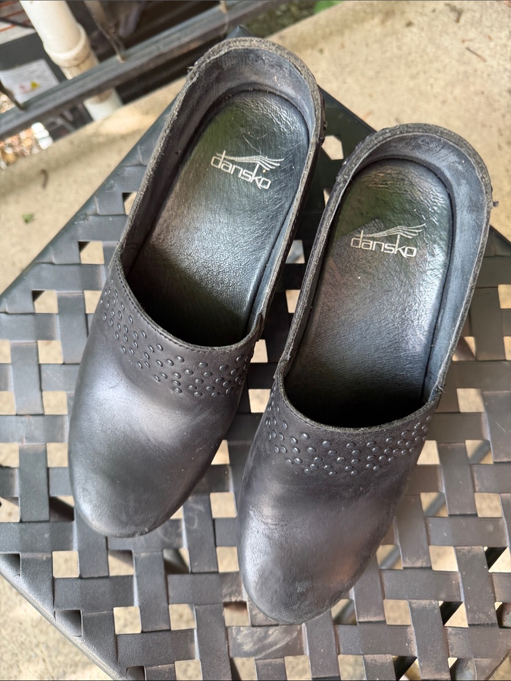 Dansko Black Leather Slip-On Mules with Perforated Detail